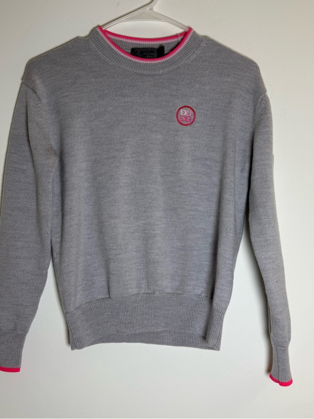 G/FORE Light Gray Circle G Crewneck Sweater with Pink Trim. Lightweight wool